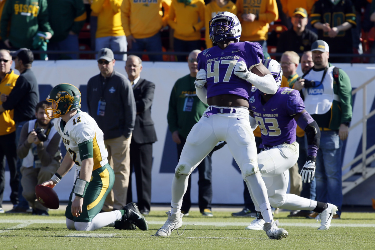 Jan 6, 2018; Frisco, TX, USA; James Madison Dukes defensive lineman Darrious Carter (47) celebrates a sack against North Dakota State Bison quarterback Easton Stick (12) in the first quarter at Toyota Stadium.